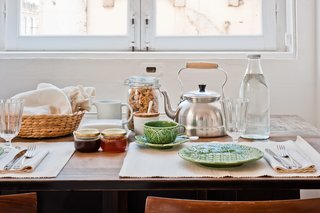 Baixa House Lets Travelers Be at Home in Lisbon - Photo 2 of 10 - Ulecia and her staff deliver homemade breakfasts and leave a linen bag with fresh bread at the door every morning. The traditional Portuguese crockery found in each kitchen was designed by Bordalo Pinheiro and features a water lily motif.