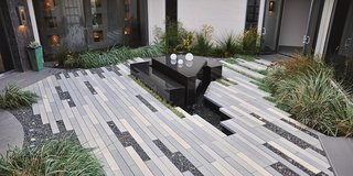 Large Scale CalArc Pavers surround an outdoor fountain at this residence. Unlike other producers, Stepstone develops its own molds.