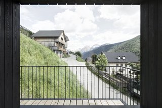 Find Sanctuary in This Chalet in the Italian Alps - Photo 3 of 12 - The loggia-inspired balcony, a fixture of the region's architecture, protects guests from harsh winds.