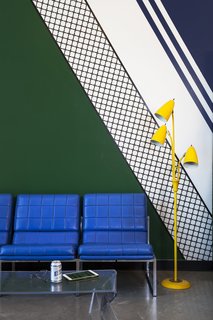 Mark Odom worked with artist Phillip Niemeyer to choose patterns, colors, and materials for the interior. Odom describes it as "a playful spin on refined, traditionally 'preppy' games like croquet, badminton, and polo."