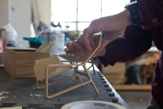 "We're really driven by understanding the costs of various materials and manufacturing processes," says Blanks. As the design team has grown, it has become more systematic in identifying needs and rounding out the portfolio. After receiving a design brief, a designer pins up initial sketches and produces scale models for group critique. Above, a Toro Chair takes shape.