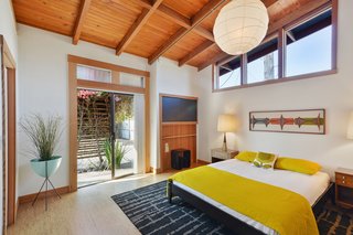 All three bedrooms have cork floors. The master bedroom opens onto the courtyard.
