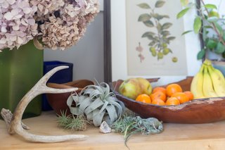 Succulents and produce maintain the home's California vibes.