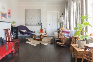 Continuing the theme of incorporating old and new, the couple furnished their home with family heirlooms from Thailand, Germany, and China alongside modern pieces. 