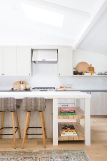 Lewis relished the decorating process, arraying the floating shelves with ceramics, art, and plants. Now that her kitchen renovation is complete, she jumps at the chance to host. One caption on her Instagram feed jokes, "We are basically just finding any reason at all to invite our friends and family over to cook and entertain. ‘Oh you made it to work on time today?!...Great, come on over, we will cook something for you."