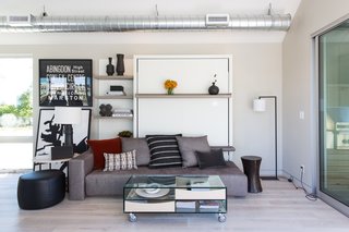 Monogram Modern Home Shows Some Southern Hospitality - Photo 5 of 8 - Michael Habachy of Habachy Designs created a textured interior, sourcing items from local boutiques and stores around Westside Provisions District, including Buzzi Boutique, Dixon & Rye, and Room & Board.