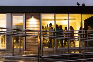 Monogram Modern Home Shows Some Southern Hospitality - Photo 7 of 8 - During a rainy evening, the Monogram Modern Home provided a warm refuge.