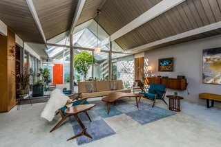 Original tongue-and-groove ceilings and Philippine mahogany paneling grace the interior.