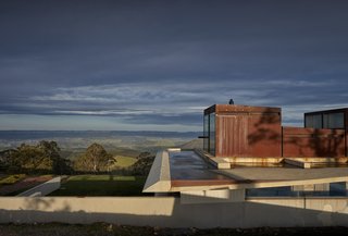 An Internationally Celebrated Home in the Australian Backcountry Asks $9M - Photo 13 of 13 - The concrete roof of Invisible House cantilevers almost four meters west and four meters east, shielding the house and creating a dam that contributes to its disappearing effect.