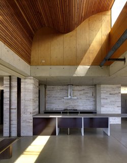 An Internationally Celebrated Home in the Australian Backcountry Asks $9M - Photo 5 of 13 - The light scoop illuminates a ceiling of sinuous plywood slats.