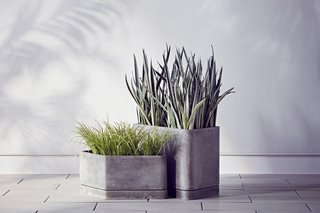 The Large and Small Hexagonal Concrete Planters are $89.99 and $69.99, respectively.