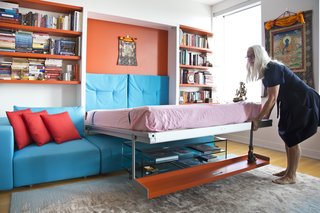 Here's another amazing multipurpose wall bed by Resource Furniture. It's a Murphy bed with couch, coffee table, and storage shelf. In the down position, it fits neatly over the Como Basso, a tempered glass coffee table on casters.