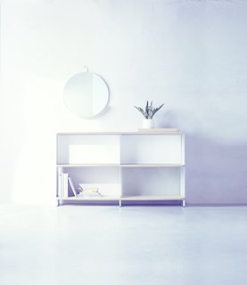 The Wait Is Over: Modern by Dwell Magazine Arrives at Target - Photo 4 of 9 - A Round Metal Shelf Mirror ($69.99) provides a small catch-all storage solution above a Bookshelf ($249.99) which combines open and closed backing.