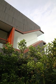 Live Outside the Box in This Artist’s Haven For $3.5M - Photo 3 of 8 - Structural, high-performance glass exposes the gallery wall to the surrounding neighborhood while protecting the artwork from UV rays.
