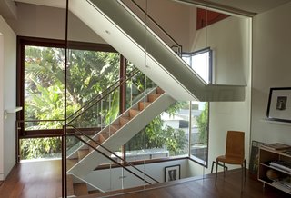 Live Outside the Box in This Artist’s Haven For $3.5M - Photo 5 of 8 - A lush nursery adjacent to the property provides green views and a sense of connection to the outdoors.