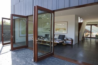 Live Outside the Box in This Artist’s Haven For $3.5M - Photo 2 of 8 - The white plaster interior acts as "the yang to the zinc's yin, or the white shirt inside a fitted black suit," says Liang.