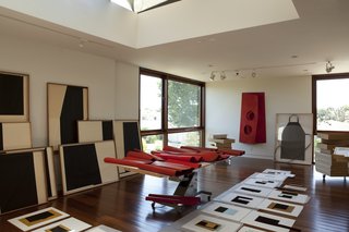 Live Outside the Box in This Artist’s Haven For $3.5M - Photo 7 of 8 - Studio space was paramount to the original homeowners. In addition to the second floor of the smaller unit, the four-car garage can also be converted into a workspace.