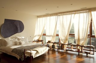 Live Outside the Box in This Artist’s Haven For $3.5M - Photo 6 of 8 - The master suite on the third floor enjoys a view of the surrounding city. 