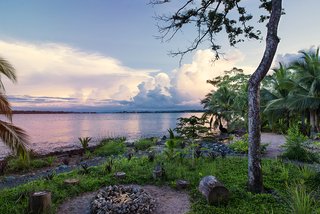 A Community-Oriented Vacation Rental in Panamanian Paradise - Photo 8 of 8 - "The house is best used when it's shared," says Christopher. "That's really showing when Airbnb guests suggest throwing the thing open." Outside, a beachside bonfire provides an inviting place to congregate.