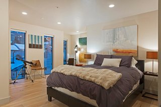 The second level holds three bedrooms and two bathrooms.