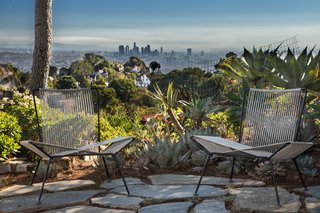 Find Seclusion in the City With This $2.5M Lloyd Wright Residence - Photo 6 of 7 - "Because the glass house is located on a ridge 40 feet above the street, it overlooks all the views yet is completely private," says Powell.
