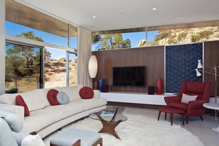 Offered at $674K, This Hybrid Prefab Is in Tune With the Californian Desert - Photo 3 of 7 - The main living areas enjoy access to a front deck as well as a more private back patio shared with the master bedroom. Thanks to prefabricated exterior wall panels known as STEPS (Steel Thermally Efficient Panels), the house is well-insulated and resistant to fire, rot, mold, and termites.