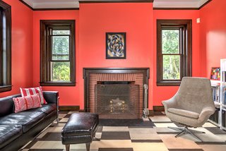 Turning left after you enter, you find what was once the fire chief's office. Reed stripped the walls of its imitation wood paneling and revealed the fireplace, which used to warm the firefighter who stayed awake through the night shift.