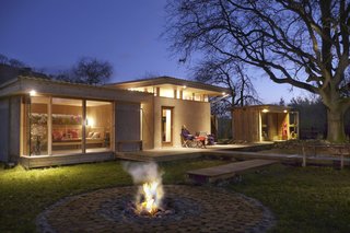 Merging modern architecture and traditional clay construction, the sauna consists of a shower room, meditation room, and a steam cabin. A glass facade offers orchard views.