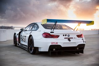 Race cars in the GTLM category typically have red mirrors, rear wing end plates, and windshield banner, but an exception was made to accommodate Baldessari's design vision.