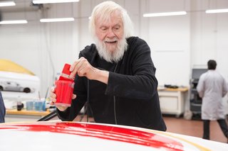 Baldessari paints an oversized red dot on the roof, staying true to his artistic trademark and boosting the car's visibility during the race. 
