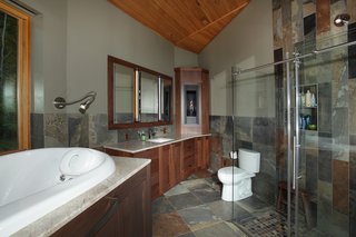 A Round Pennsylvania Prefab Offers 360-Degree Solutions in Sustainability - Photo 4 of 7 - The tree that produced the white oak for the master bathroom previously grew in the same spot. "Deltec let me focus on areas I could figure out," says Sanders of his deep involvement with the project. "It was a great fit."
