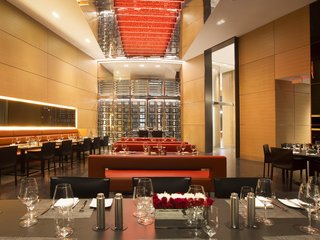 A restaurant caters to residents with indoor and outdoor seating, a lounge bar overlooking the Atlantic, and private wine lockers. 