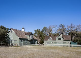 The lot originally housed the equestrian facilities of a larger, 10-acre estate. The stables, tack room, birthing shed, barn, and riding ring and turnouts still stand. 