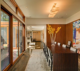 The formal dining room can open onto the terrace as well, while sliding pocket doors give the option of privacy and intimacy.