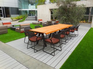A commercial space in San Mateo, California, boasts Large Scale CalArc Pavers that echo the structural lines of the aluminum- and glass-clad building. 