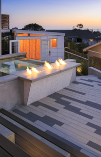 Large Scale CalArc Pavers in alternating colors liven up a private residence. Stepstone tackles both residential and commercial projects through a handmade production process that handles runs of all sizes.
