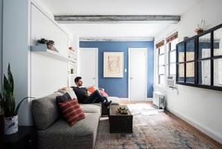 "My Resource Furniture system lets me hide the cumbersome qualities in an apartment," says Kantor. "It's a lot more elegant and opens up the space." Inspired to devise his own creative solutions, Kantor disguises his television with a mirror, creating the illusion of a larger room.