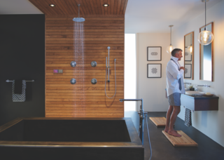 Turn Your Bathroom Into a Private Sanctuary With These Upgrades - Photo 4 of 5 - Both practical and economical, the U by Moen shower runs the water until it hits your preset temperature, pausing it until you're ready to step in.