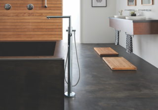 Turn Your Bathroom Into a Private Sanctuary With These Upgrades - Photo 3 of 5 - The One-Handle Tub Filler includes a handheld shower for versatile bathing options.