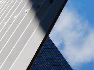Ground Zero Balance: "Massive white wings of Santiago Calatrava's Oculus structure play a part in the somber balance of light and shadow, sky and structure, old and new, heavy and light, at the Ground Zero memorial in NYC." 