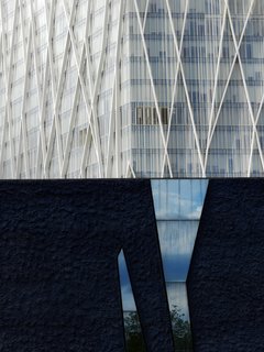 Mirror Facade. "An attractive white facade on the coast of Barcelona can overwhelm standing by itself in a photographic frame," says Olic. "Combining it with an unrelated close-by culture center and its own mirrored facade helps balance and bring both facades into focus and comparison." 
