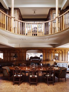 Resembling the Inverted Hull of a Ship, an English Guest House Pays Homage to the Harbor - Photo 3 of 13 - A circular gallery occupies the floor above the repurposed second-class lounge.