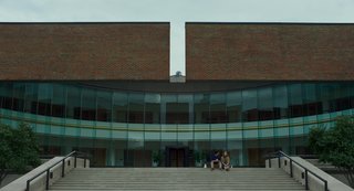 In the Indie Debut “Columbus,” Midcentury Architecture Stars Beside John Cho - Photo 5 of 7 - Jin and Casey chat in front of the Columbus City Hall, designed by Edward Bassett in 1981.