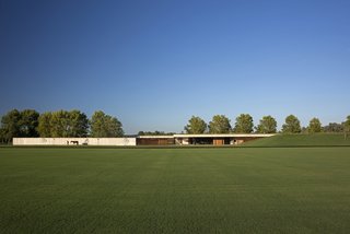 Celebrated Polo Player Nacho Figueras Commissions a Low-Slung, Concrete Stable - Photo 1 of 11 -