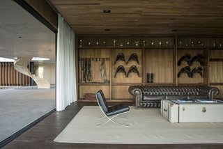 Celebrated Polo Player Nacho Figueras Commissions a Low-Slung, Concrete Stable - Photo 6 of 11 -