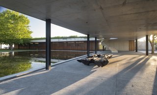 Celebrated Polo Player Nacho Figueras Commissions a Low-Slung, Concrete Stable - Photo 8 of 11 -