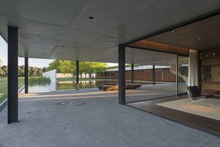 Celebrated Polo Player Nacho Figueras Commissions a Low-Slung, Concrete Stable - Photo 7 of 11 -