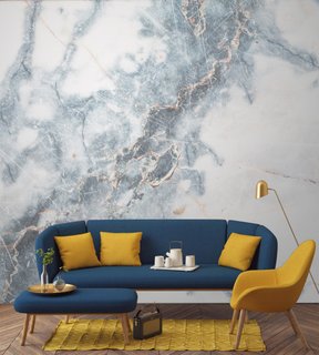 This marble-inspired wallpaper above brings a touch of natural elegance to the sitting area. 