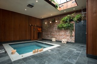 Former Auto Body Shop Transformed Into Zen Bathhouse - Photo 1 of 13 -