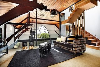 An Anglican church in Melbourne dating back to 1892 was converted by Bagnato Architects to include a modern addition and interior renovation. Spread over multiple levels, the home features a variety of natural materials, like reclaimed wood, limestone, marble, and granite, giving the inside a warm and cozy feel.